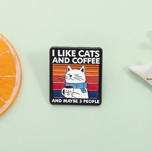 Funny enamel cat brooch with I Like Cats and Coffee quote on a light green background