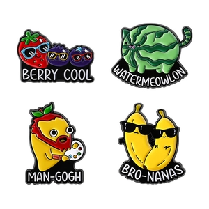 Set of four creative fruit enamel pins including funny strawberry and mango badges