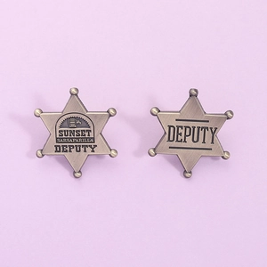 Vintage bronze hexagram star badges featuring Sunset Sarsaparilla and Deputy engravings