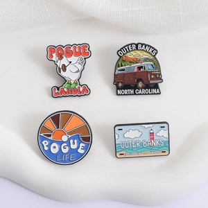 Outer Banks enamel pins set with chicken, vintage bus, sunset and lighthouse patterns