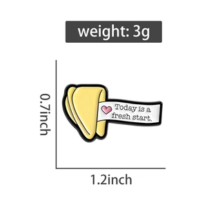 Detailed view of fortune cookie enamel pin with Today is a fresh start text and dimensions
