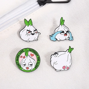 Funny cartoon garlic enamel pins set shown on a white canvas bag for creative decoration