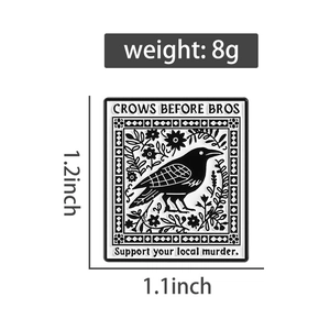 Macro detail of enamel crow brooch featuring Crows Before Bros text and dimensions