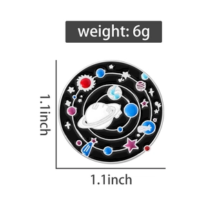 Detail view of 1.1-inch universe enamel pin with planets showing 6g weight and size specs