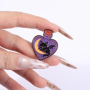 Macro shot of an enamel black cat pin with a purple heart bottle and bat wings