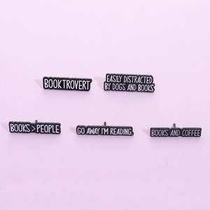 Five-piece set of black enamel pins for book lovers with minimalist slogans and quotes