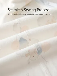 Cotton baby romper with seamless sewing and soft cartoon elephant and balloon patterns