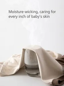 Body bébé respirant en tissu thermique doux montrant un test d'évacuation d'humidité