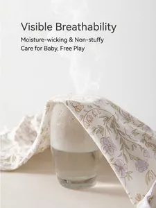 Breathable cotton baby floral romper showing steam passing through the fabric