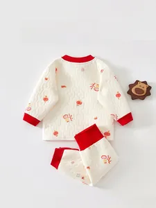 Close-up detail of quilted thermal fabric and back view of the Chinese style baby suit