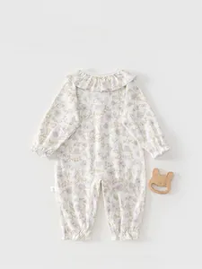Detailed back view of a baby floral romper featuring a ruffled collar and elastic cuffs