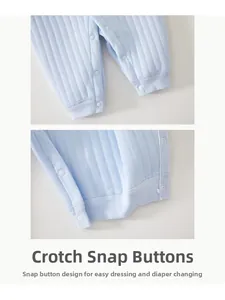 Detailed view of the snap button crotch closure on this soft light blue baby romper