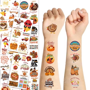 Cartoon Thanksgiving temporary tattoos featuring turkeys and pumpkins on arms