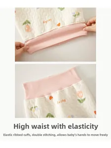 Detailed view of baby high-waist thermal pants featuring quilted fabric and pink elastic waistband
