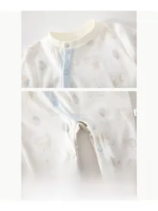 Detail of the high-quality resin snap buttons on this soft cotton baby elephant jumpsuit