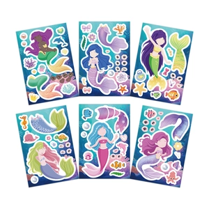 Flat lay of six mermaid DIY dress-up stickers with colorful sea creature accessories
