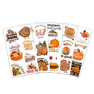 Set of Thanksgiving temporary tattoos with cartoon turkey and pumpkin designs