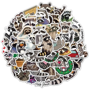 Close-up of waterproof raccoon stickers featuring fun trash panda poses and expressions