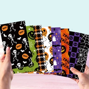 Set aus 8 Halloween Dekopapieren mit Kürbis-, Geist- und Spinnennetzmuster für Bastelprojekte