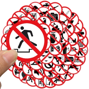 Close-up of waterproof PVC warning signs and funny prohibition stickers for luggage and car