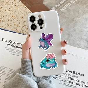 White silicone phone case featuring cute cartoon frogs with wings and flower details
