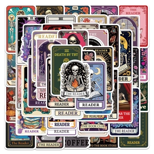 Close-up of Gothic tarot reading stickers featuring skulls and mystical dark aesthetic designs