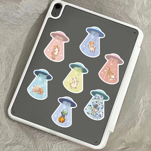 UFO series cartoon stickers featuring aliens and animals on a gray tablet cover