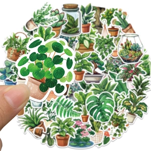 Detailed view of monstera and cactus waterproof stickers showing realistic size and size scale