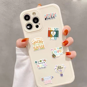 Detailed close-up of teacher and special education stickers on a phone case