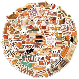 Vista detallada de pegatinas de otoño con libros, calabazas y diseños acogedores