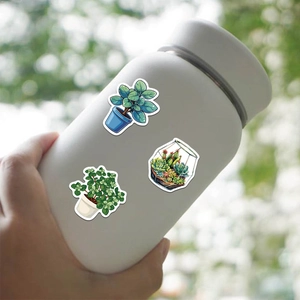 Waterproof PVC fresh plant stickers applied on a white water bottle for outdoor decoration