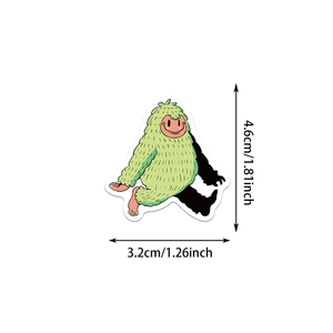 Detail showing dimensions of a green cartoon monster sticker for DIY scrapbooking