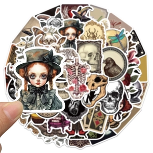 Vintage gothic stickers set with skull and raven designs for laptop and journals