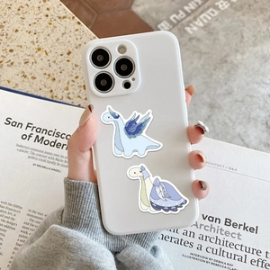Close-up of a white silicone iPhone case featuring cute cartoon dinosaur illustrations