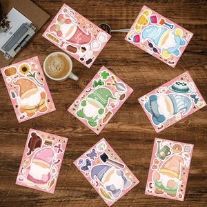 Flat lay of 8 cute gnome cartoon stickers with gardening and food motifs on wooden table