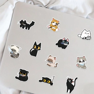 Set of 12 cute cartoon cat stickers with knives on a laptop, funny black cat DIY decals