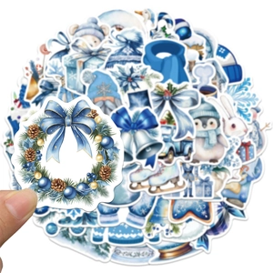Autocollants d'hiver imperméables avec couronnes de Noël bleues et manchots en bleu doux