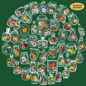 Detailed flat lay of 50 pieces hand-drawn floral stickers in bottles on green background