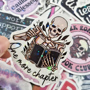 Holographic romantic book stickers with One More Chapter design and glitter laser finish
