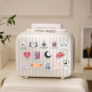 Detail of 14 romantic reading stickers with book themes on a white striped suitcase