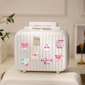 Autocollants PVC Book Lover roses appliqués sur une boîte de rangement blanche rainurée