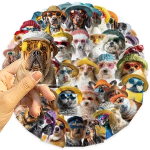 Close-up of hand holding a waterproof pet sticker with dog wearing stylish sunglasses