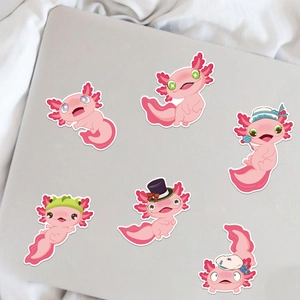 Cute pink axolotl make-a-face sticker set on a laptop cover for children crafts