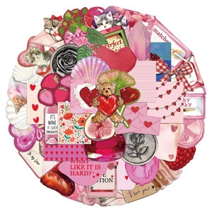 Dettaglio di simpatici adesivi rosa con gatti, cuori e motivi romantici per il fai-da-te