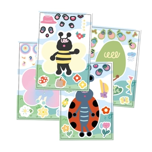 Close-up of DIY garden animal sticker sheets with colorful bees and ladybugs for kids