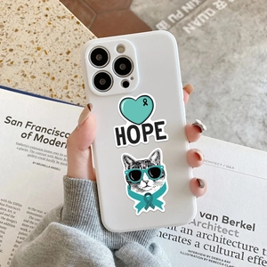 Detail of Ovarian Cancer awareness stickers on a white phone case with HOPE text and cat