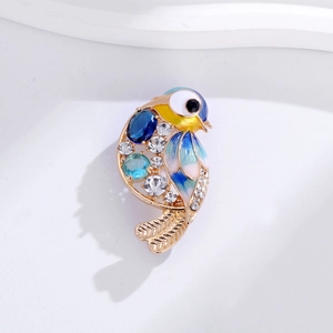 Broche oiseau élégante en émail bleu avec cristaux pour manteaux de luxe pour femmes
