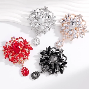 Elegant flower-shaped glass brooches with water drop pendants in four different color options