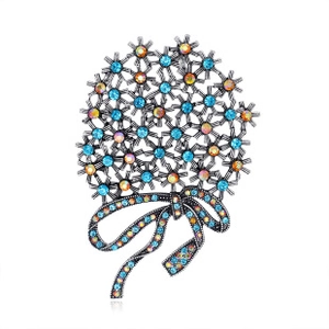 Detail of flower bouquet brooch with sparkling blue and aurora borealis crystals
