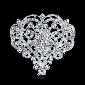 Exquisite silver heart brooch with sparkling white rhinestones and hollow filigree design